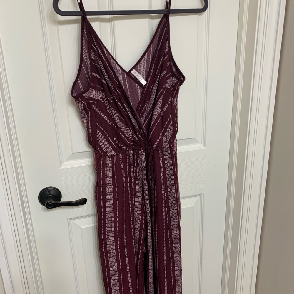 V neck maroon jumpsuit with white striped design